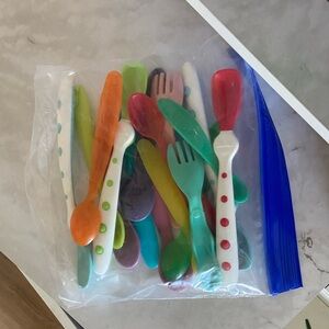 Assorted bag of toddler utensils